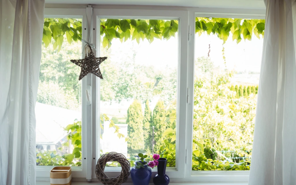 Bright interior view of stylish casement windows installed in a Toledo, Ohio home, bringing in fresh airflow.